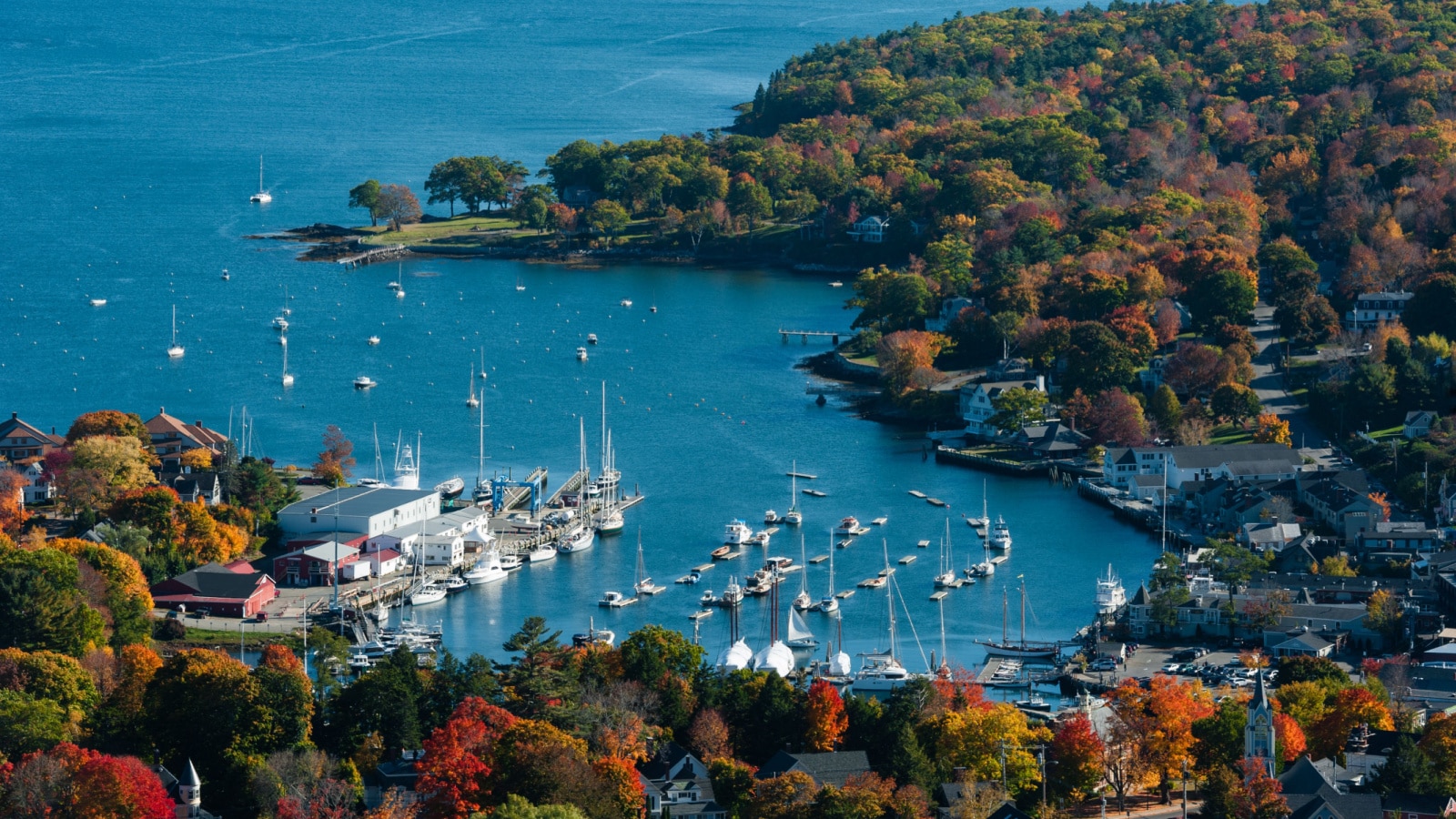 Aerial view of Camden, Harbor Maine with fall foliage