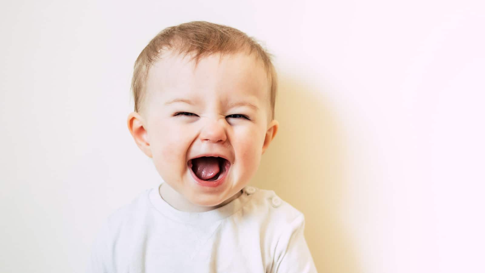 Baby with flu laughing