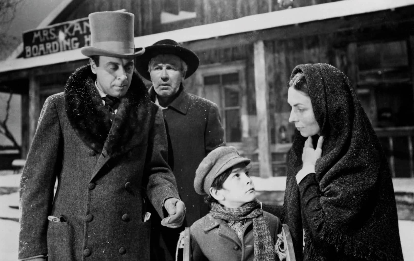 Agnes Moorehead, George Coulouris, Harry Shannon, and Buddy Swan in Citizen Kane (1941)