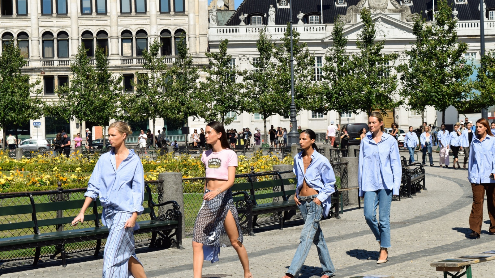 copenhagen denmark - august 11th 2022 : fashion models walking around kongens nytorv square in downtown copenhagen.