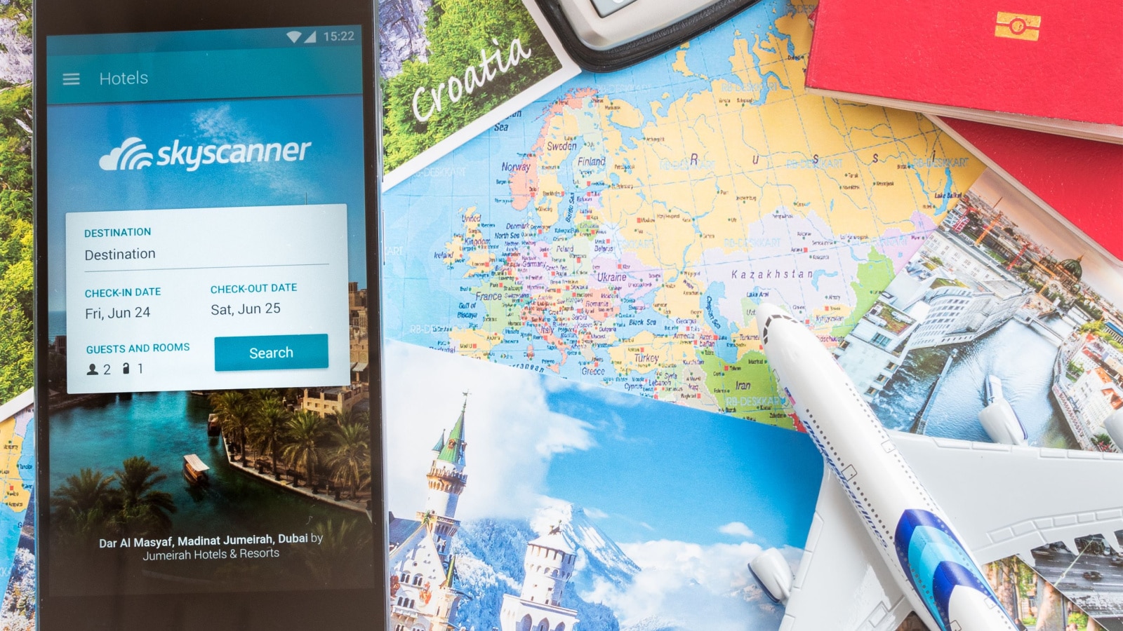 MANCHESTER, UNITED KINGDOM -27 JUNE 2016: Mobile apps make traveling so much easier. Search, compare and book cheap flights on the go with the award-winning Skyscanner Flights app!