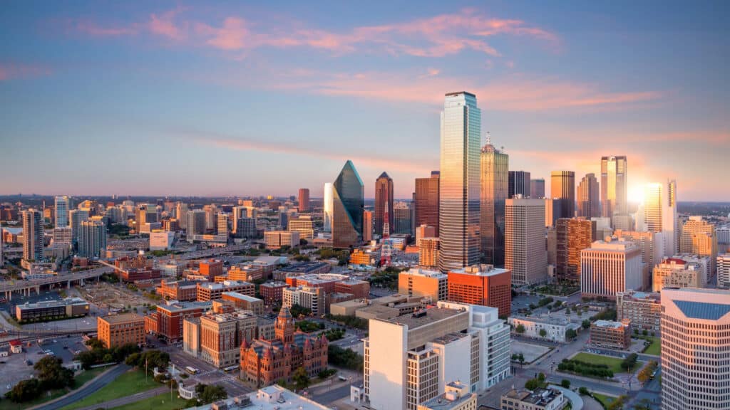 Dallas, Texas cityscape with blue sky at sunset, Texas