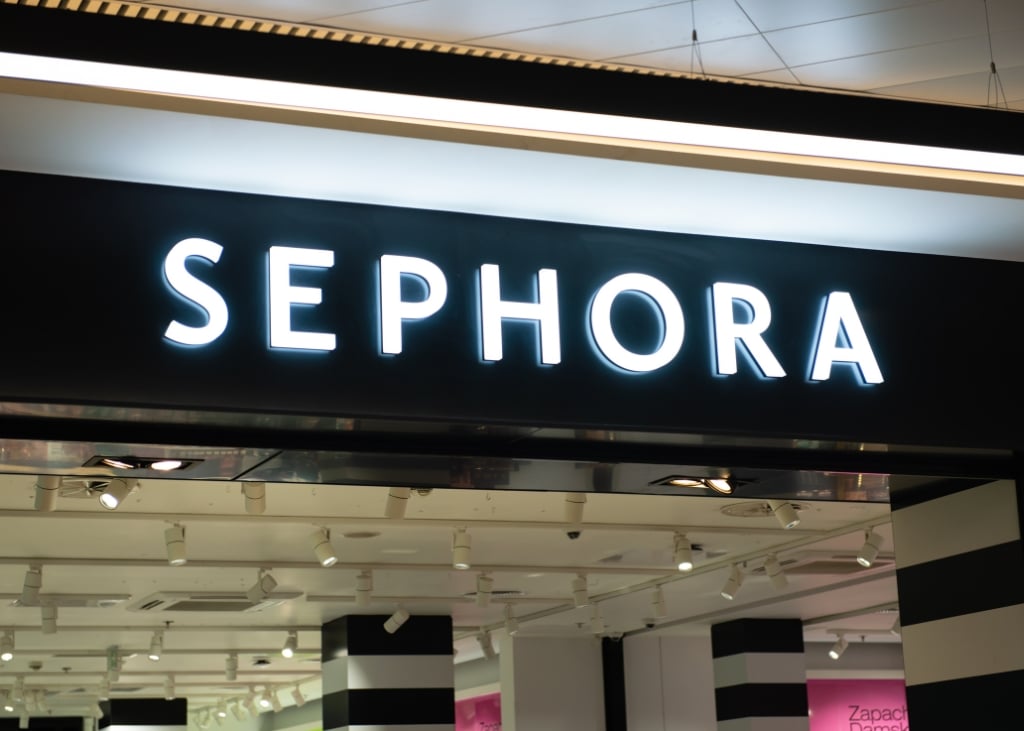 Sephora storefront with name in white lettering on black background