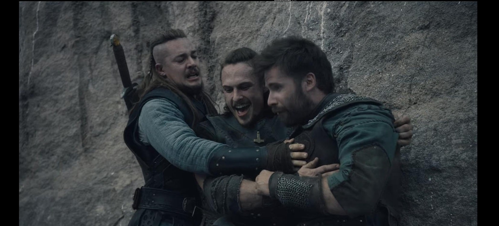 Alexander Dreymon, Mark Rowley, and Arnas Fedaravicius in Episode #5.9 (2022)