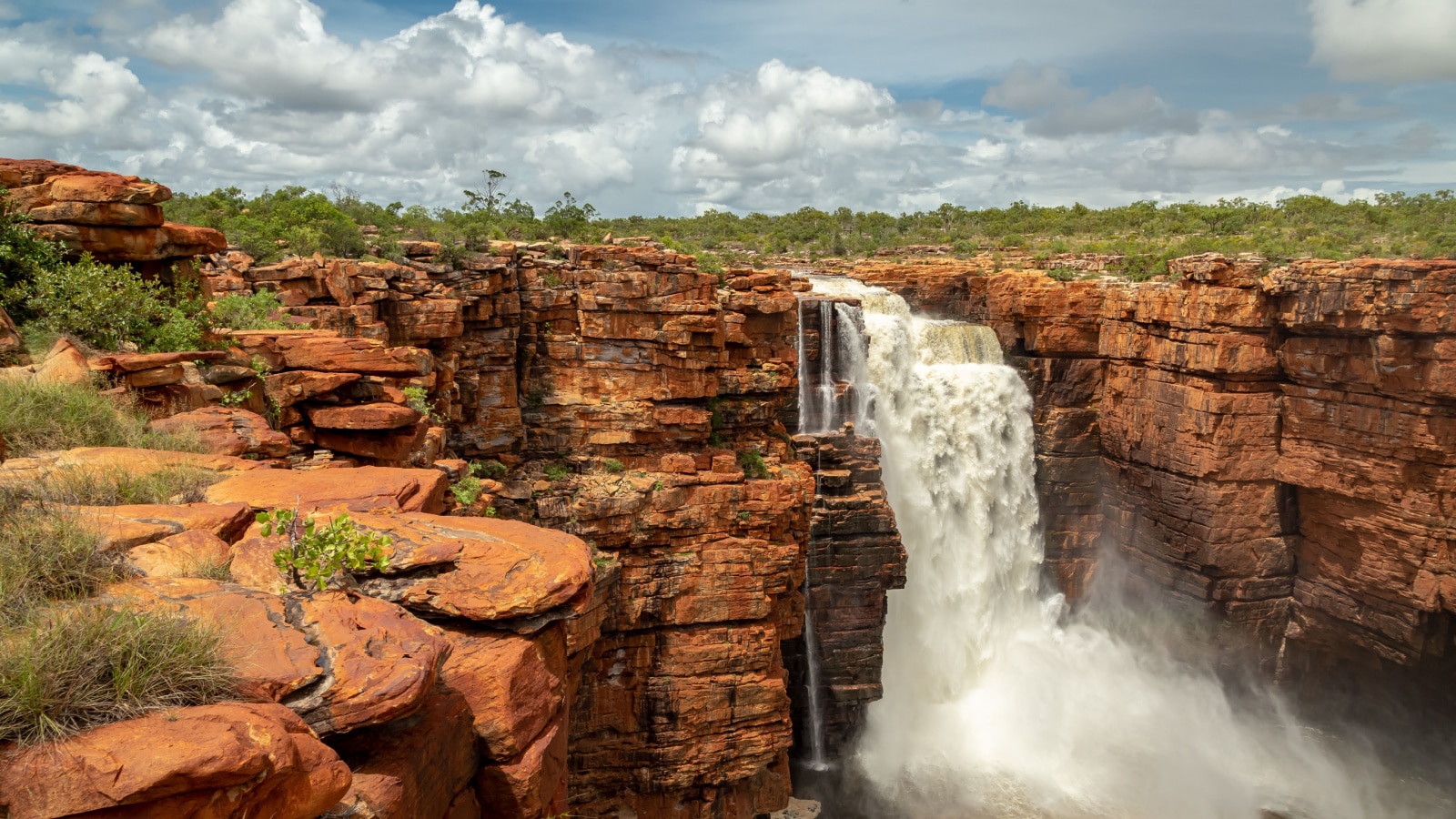 Landscape view at the top of one of the twin King George Falls in flood, Kimberley, Australia