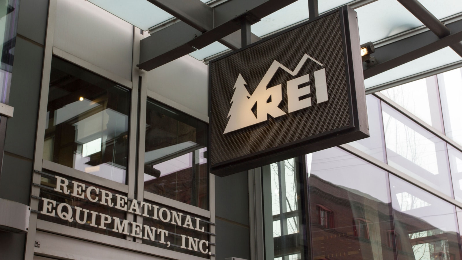 Portland, Oregon - Feb 8, 2019: The REI sign at the entrance of its store in Portland. Recreational Equipment, Inc. is an American retail and outdoor recreation services corporation.