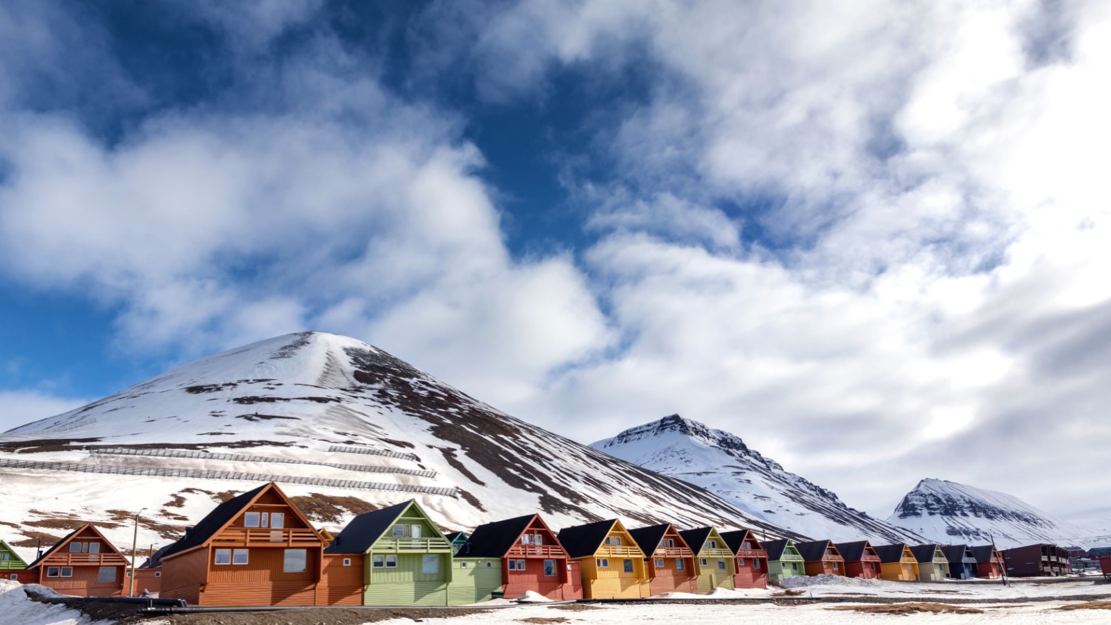 Row of colourful chalet houses in Longyearbyen, Svalbard, the most northery town in the world. Svalbard is a Norwegian archipelago between mainland Norway and the North Pole.