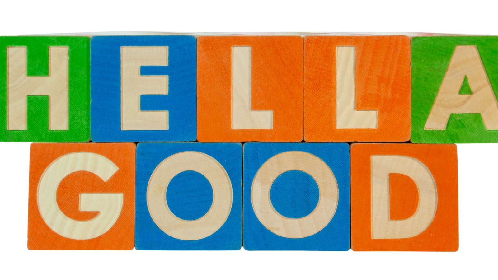 HELLA GOOD concept spelled out with toy blocks. HELLA GOOD means very or extremely good.