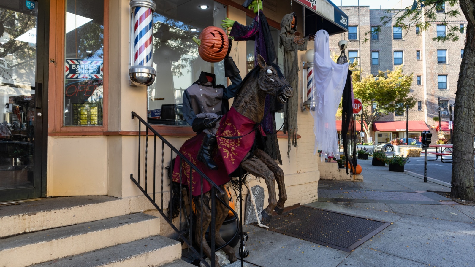 Sleepy Hollow, New York USA - October 19 2021: Headless Horseman Halloween Decorations at a Barbershop in Downtown Sleepy Hollow New York
