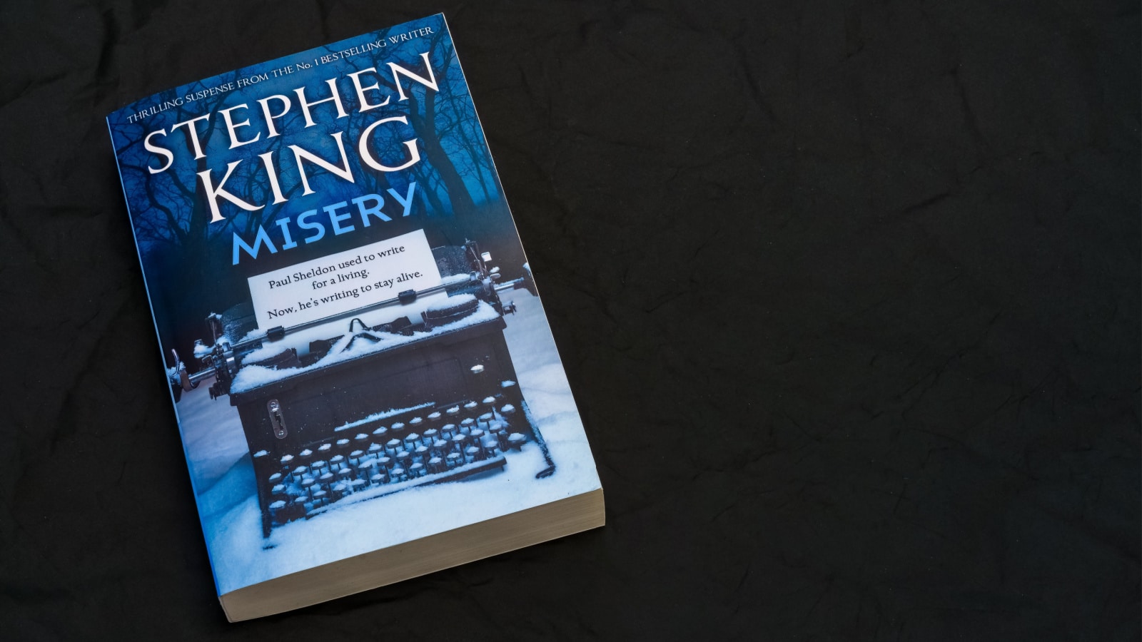 Misery by Stephen King on dark surface. Lahti, Finland. June 18, 2023.