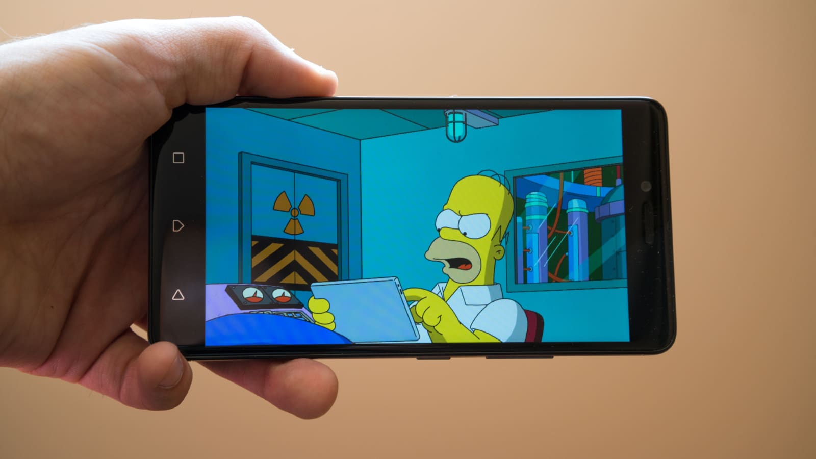 Nitra, Slovakia, March 20, 2017: The Simpsons Tapped Out application logo on smartphone