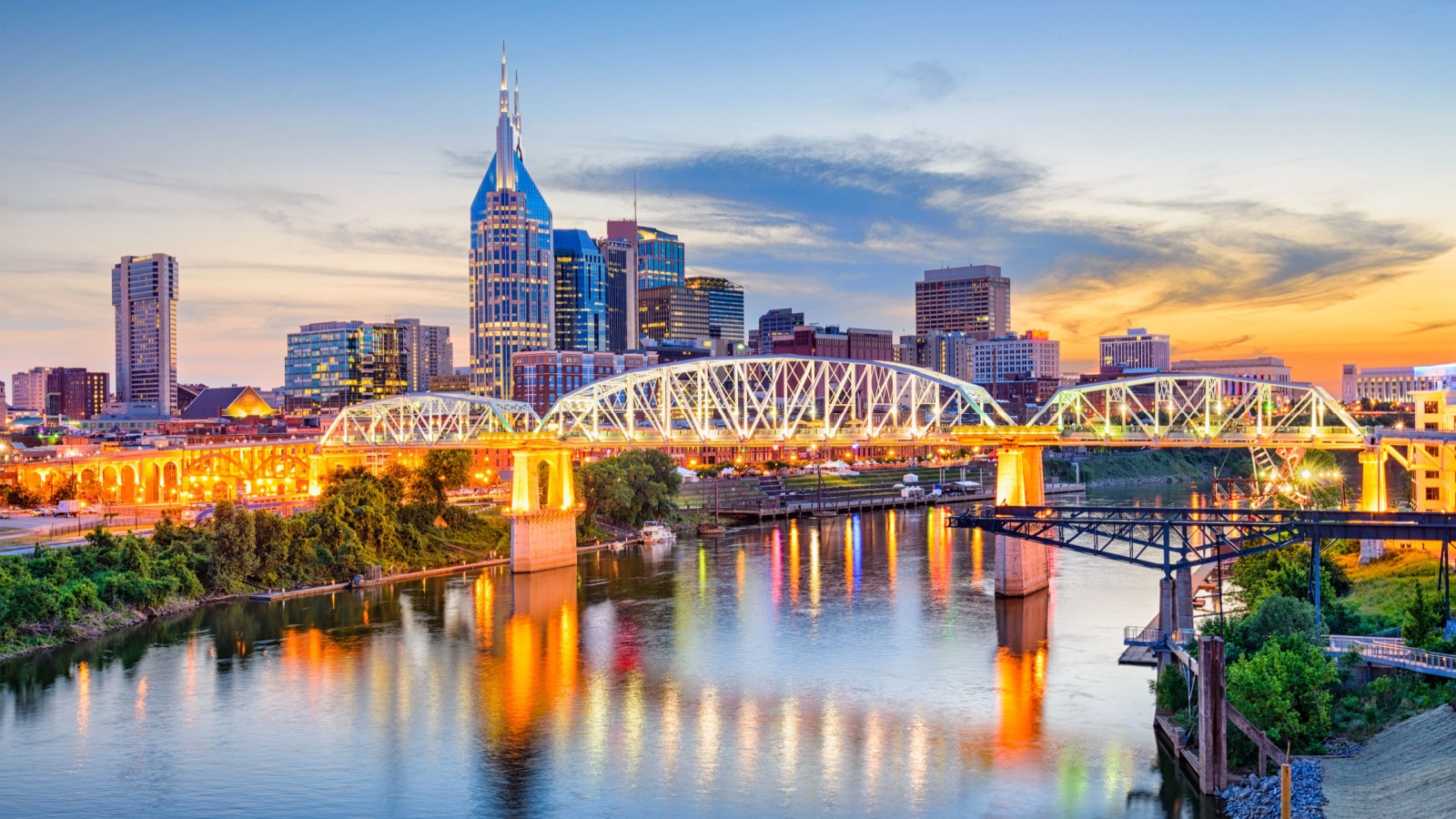 Nashville, Tennessee, USA downtown skyline on the Cumberland River.