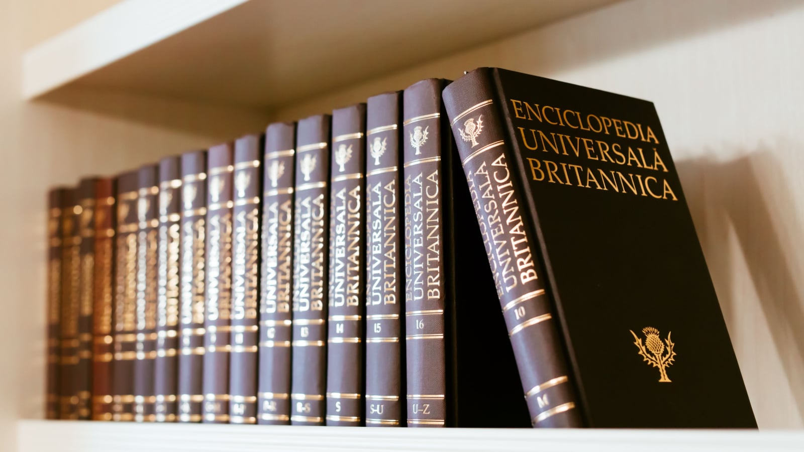 Chisinau, Moldova - March 2019: Encyclopedia Britannica - Complete stack of "Enciclopedia Universală Britanica" composed of 16 volumes in romanian language.