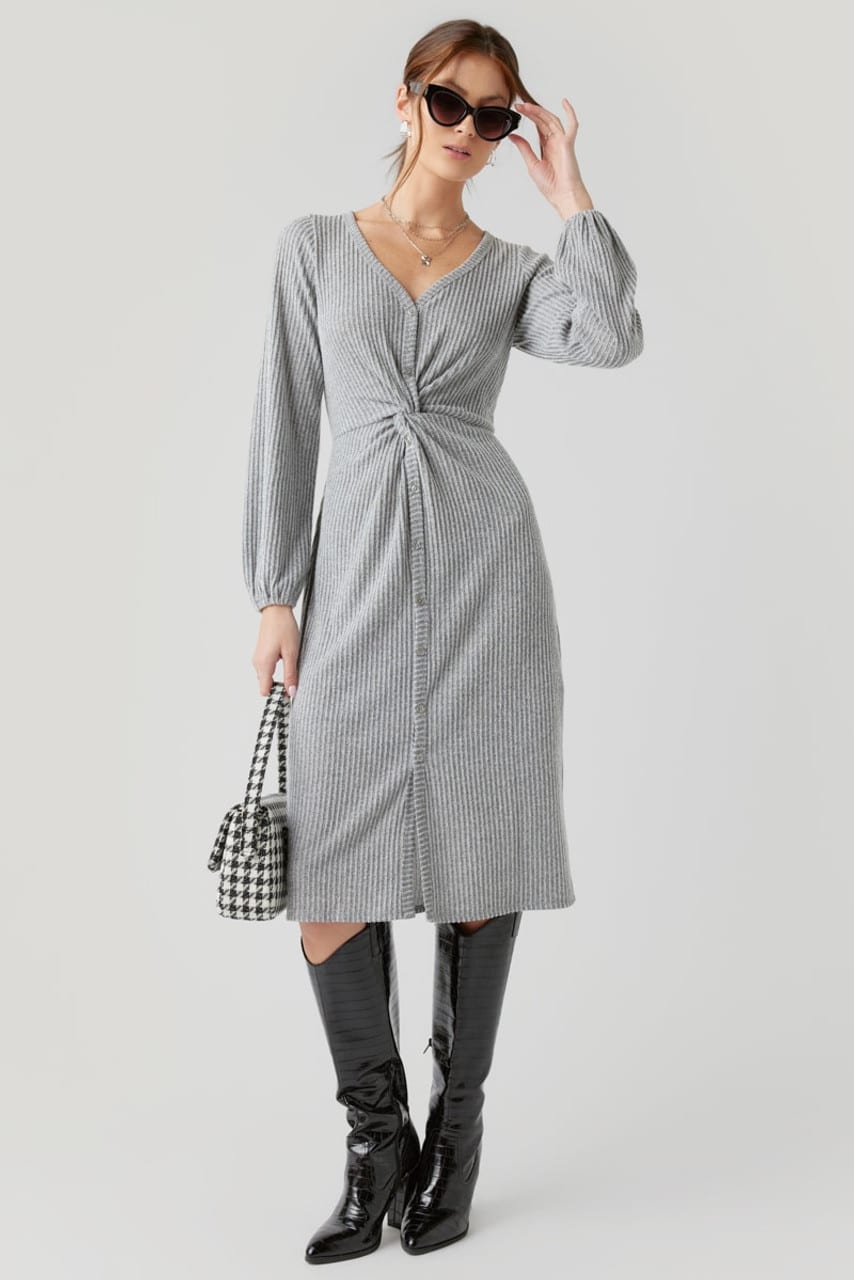 Jinny Ribbed Knitted Midi Maxi Dress in Gray paired with black knee high boots and sunglasses
