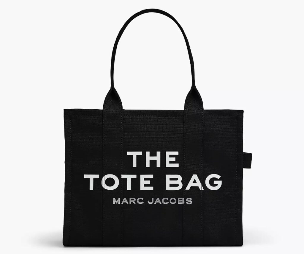 THE
LARGE TOTE BAG in black by Marc Jacobs against a white background