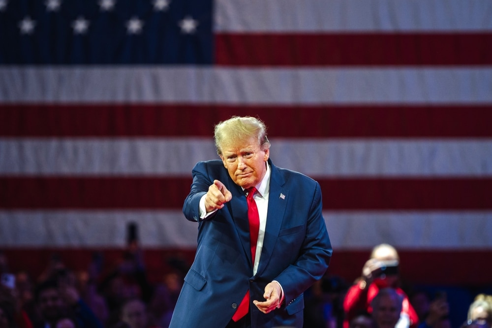 NATIONAL HARBOR, MD, USA- February 24, 2024: Donald Trump speaks at an event about his plan for defeating current President Joe Biden in November.