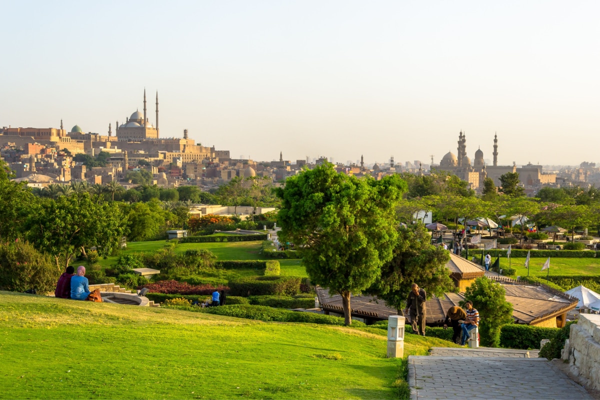 Cairo, Egypt – May 25, 2016 – View of the Al-Azhar Park gardens. In the background, The Great Mosque of Muhammad Ali Pasha, a mosque situated in the Citadel of Cairo