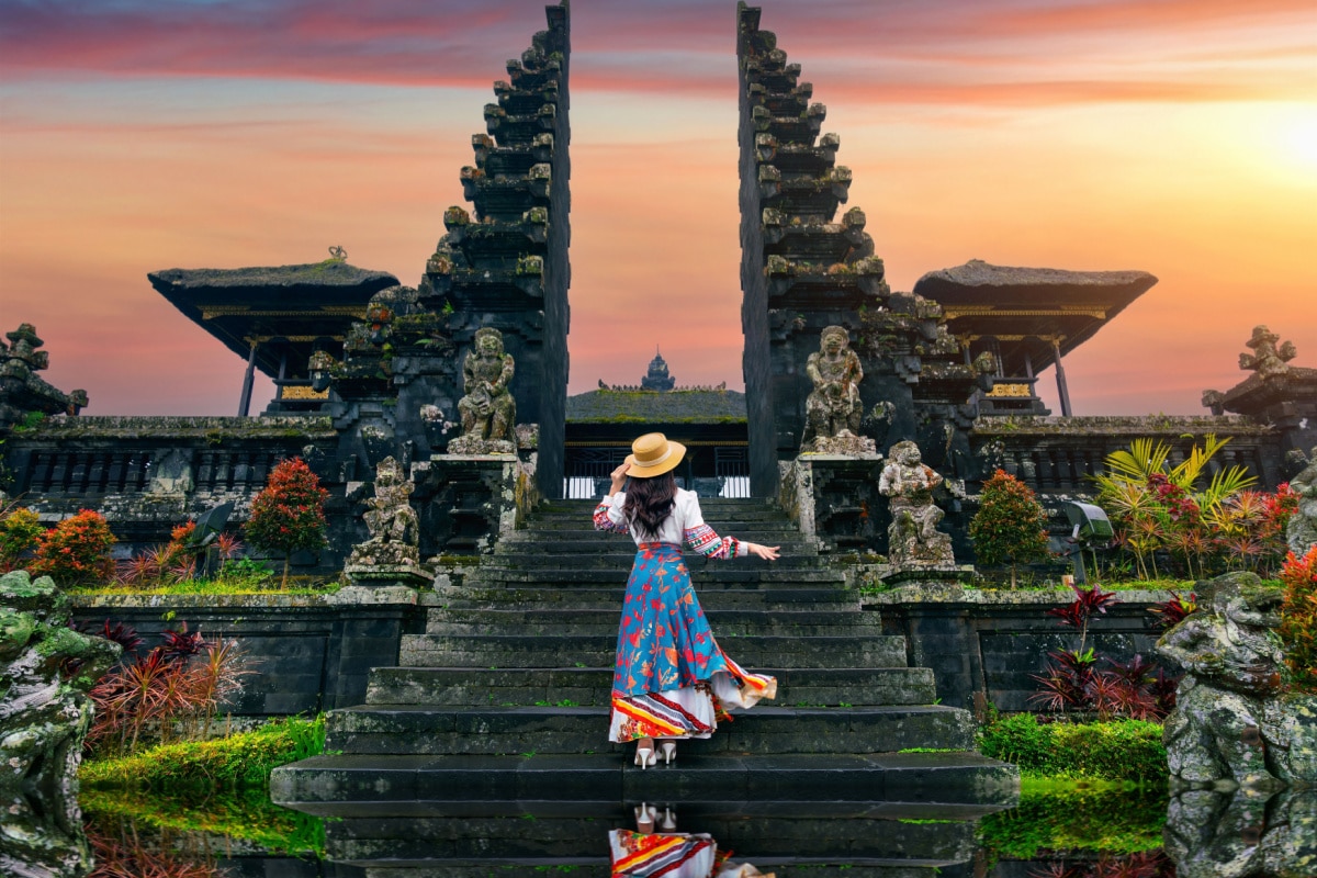 Women tourists standing at Besakih temple in Bali, Indonesia.