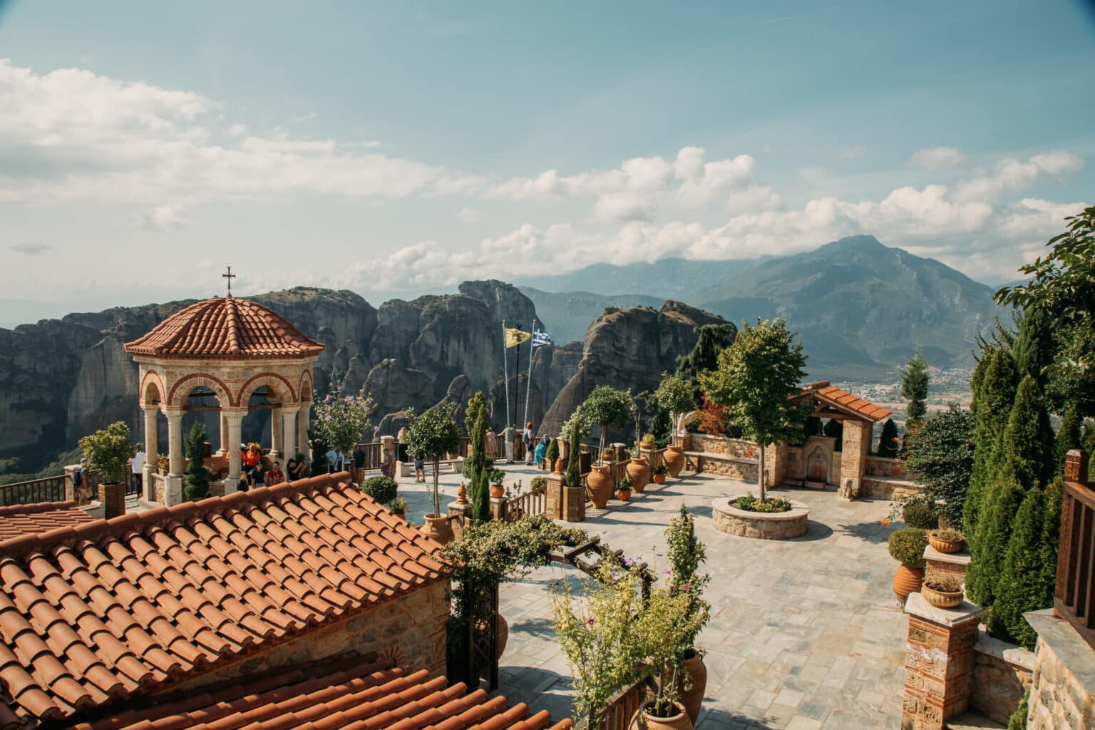 A view of a monastery in Meteora Greece on a bright sunny day