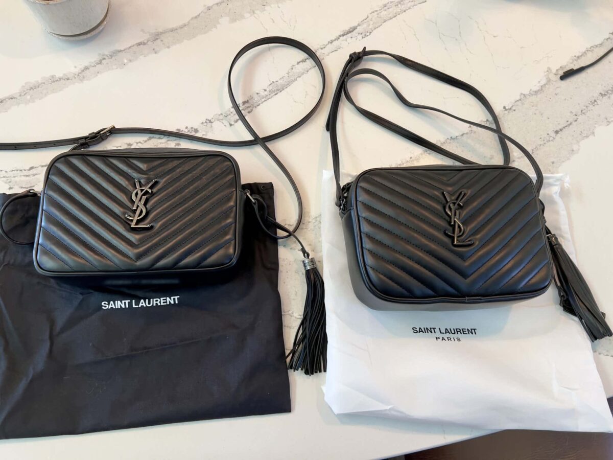 Two black YSL lou camera bags laying side by side, one is real and one is a fake