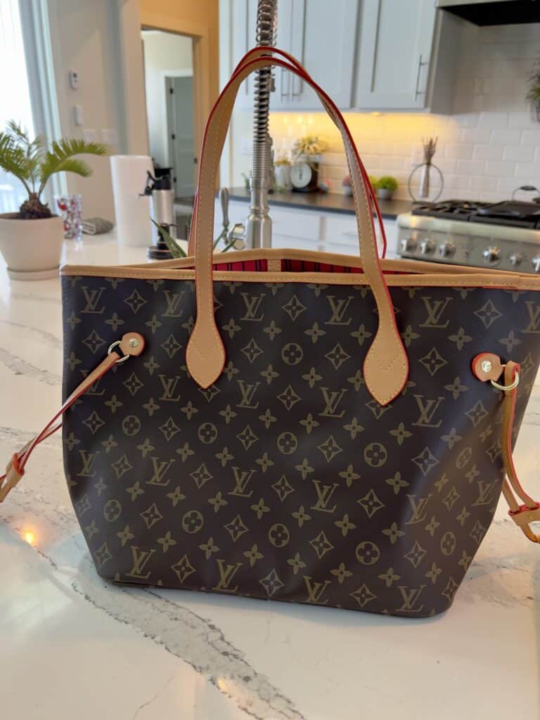a neverfull bag from DHgate sitting on a kitchen counter