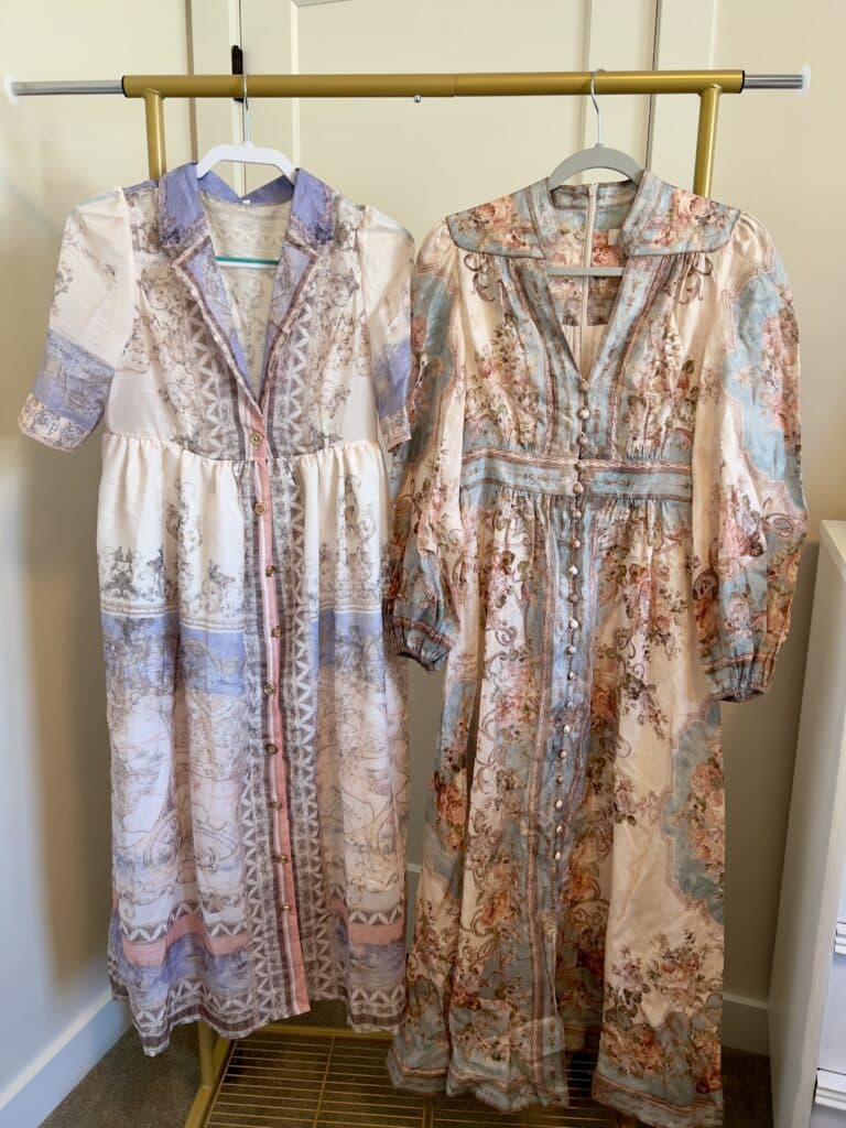 2 dresses hanging side by side on a rack