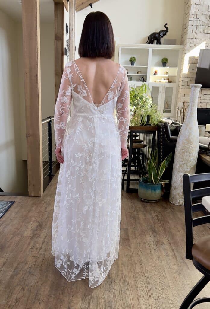 Lindsey shows the back of her inexpensive wedding dress