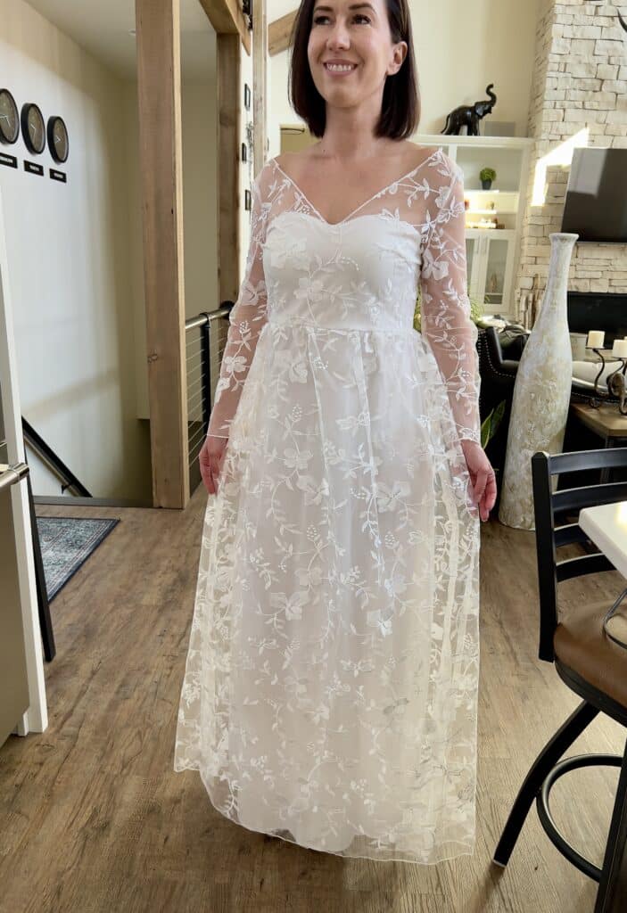 Lindsey of Have Clothes, Will Travel wearing a cheap wedding dress with sleeves from DHgate