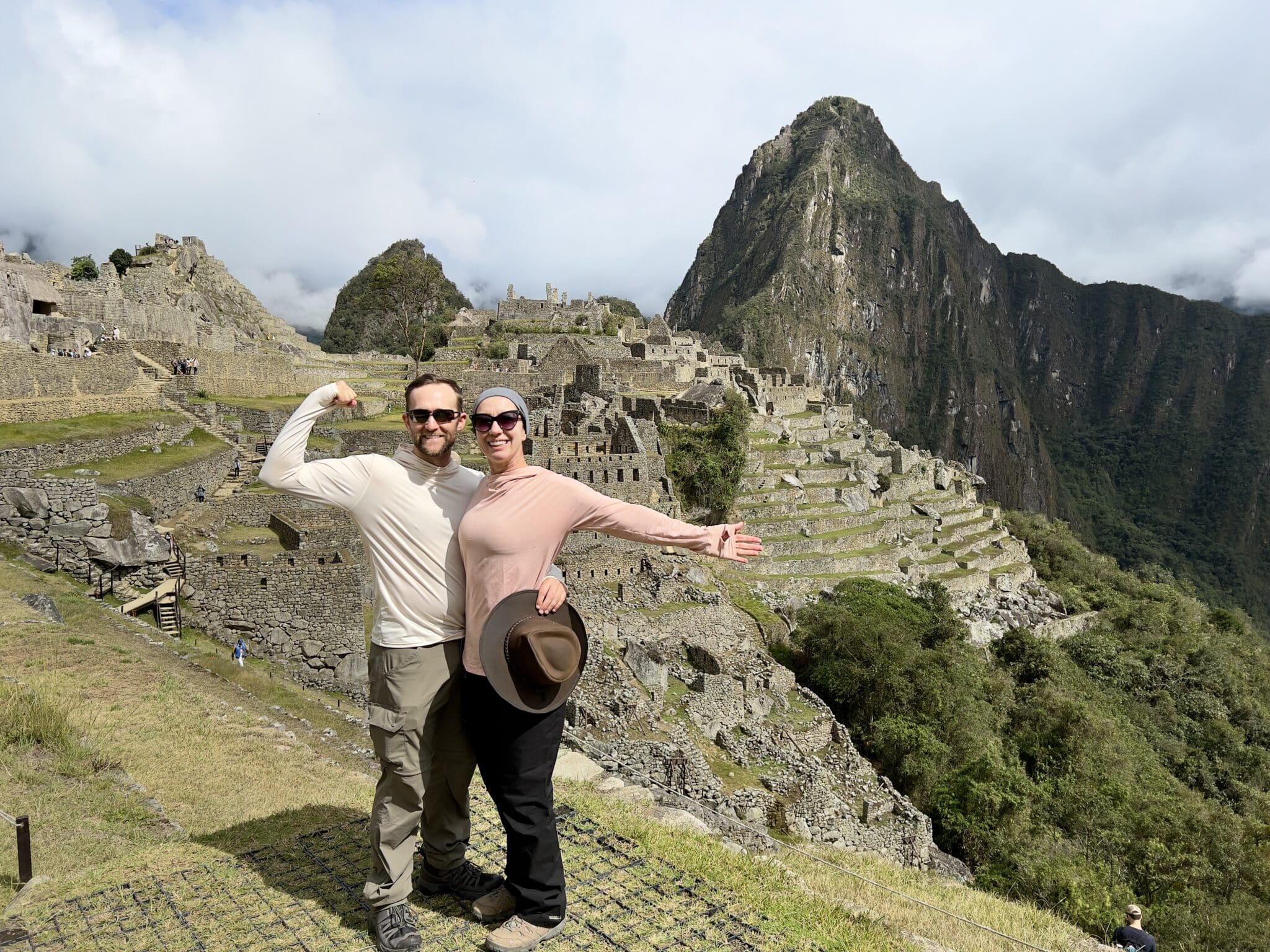 2 hikers posing by Machu Picchu after the Inca Trail trek