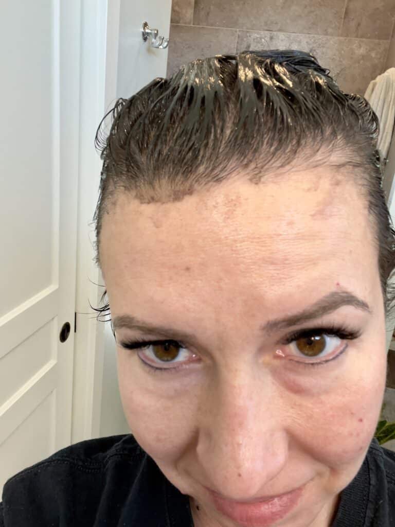 A closeup of Lindsey's horrible hair dye job, she has it all over her forehead 