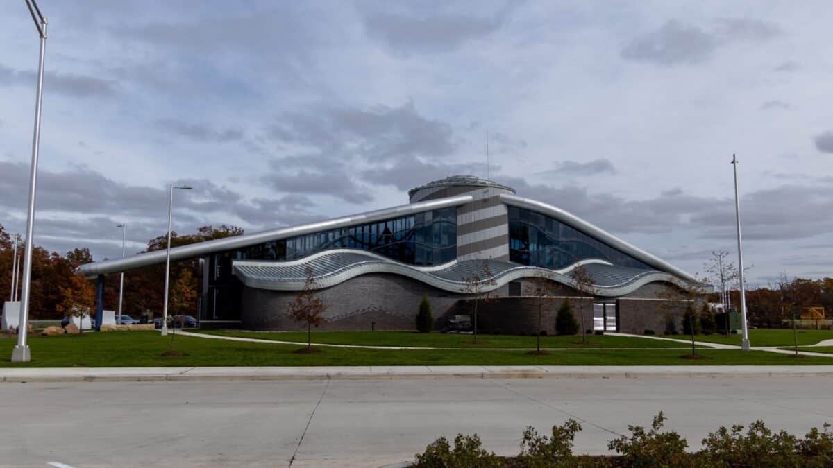 Whitestown, Indiana, USA - 04.01.2024: Indiana welcome center. Sleek, modern architectural design of a public building with a unique roof structure, under a cloudy sky