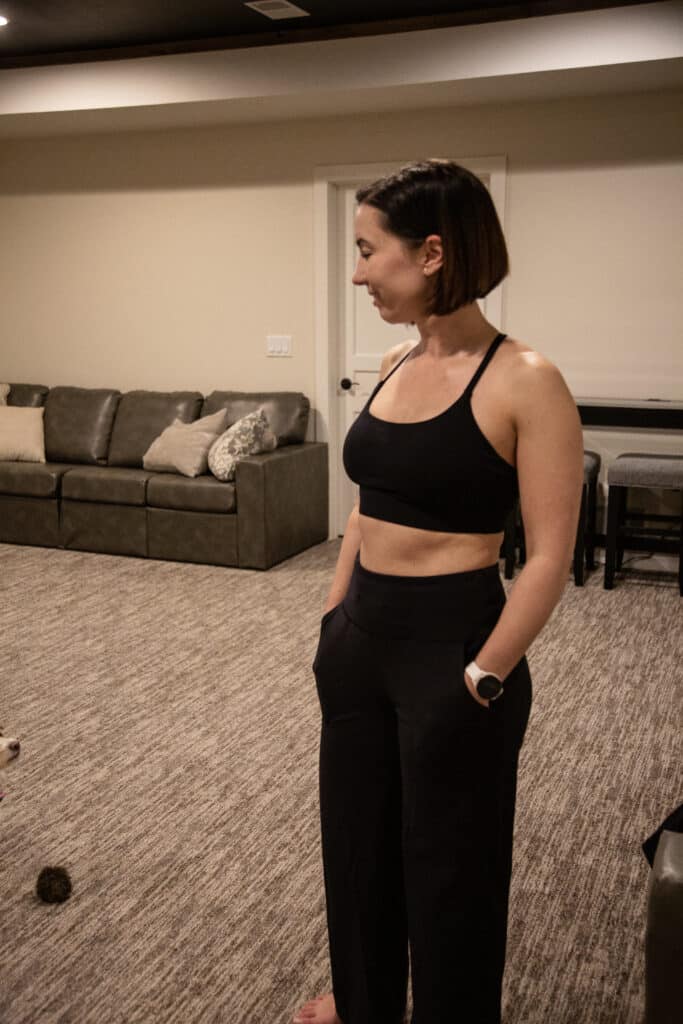 Lindsey wearing an IUGA black sports bra