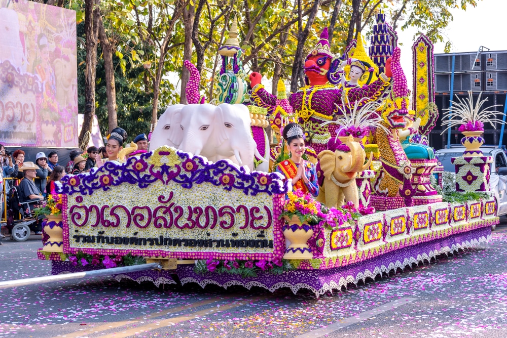 CHIANG MAI,THAILAND-FEBRUARY 02, 2019 :Unidentified peoples are in parade with fresh flowers decorate car in annual 43 th Chiang Mai Flower Festival.