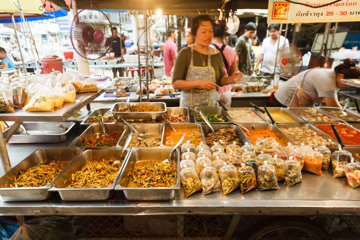 BANGKOK, THAILAND, NOV 4, 2017: Many delicious prepared Thai foods are sold at the daily Or Tor Kor Fresh Food Market