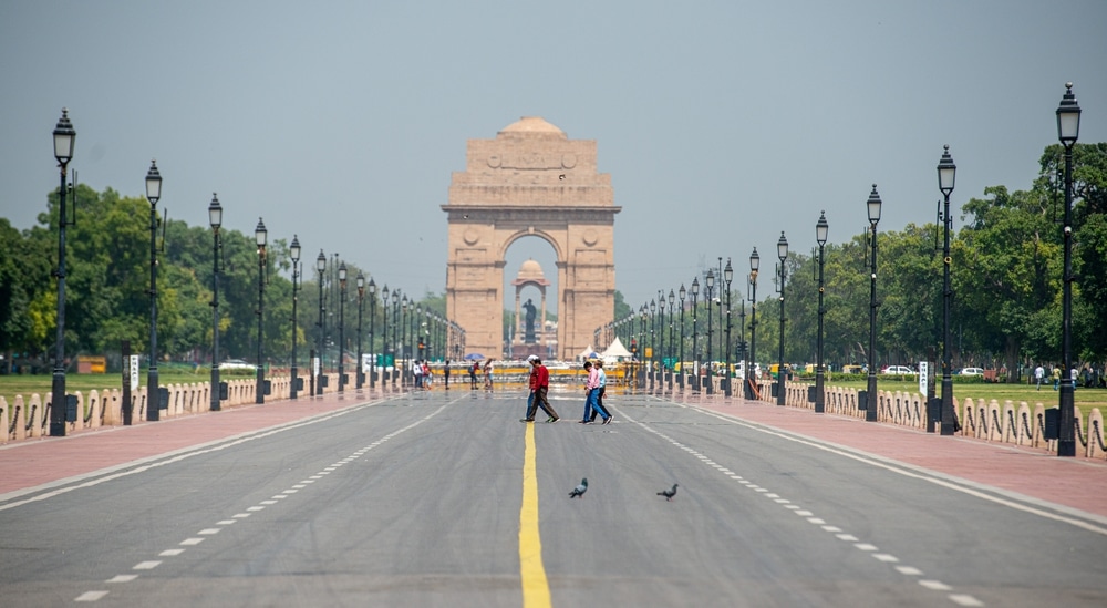 New Delhi, India-May 21 2024: Indian tourists walking on Kartvya Path in front of India Gate during the heatwave season in Delhi and North India.