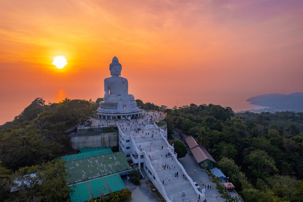 Statue big Buddha in Phuket on sunset sky, aerial top view. Concept travel Thailand landmark.