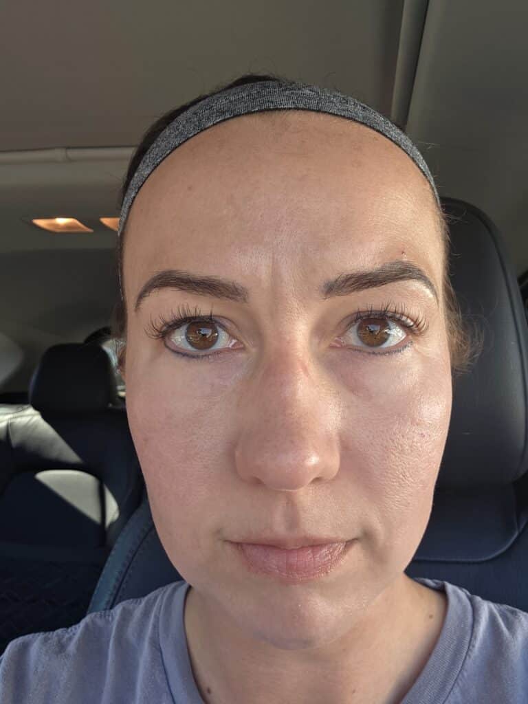 Close up of my face, showing my eyelash extensions still in place