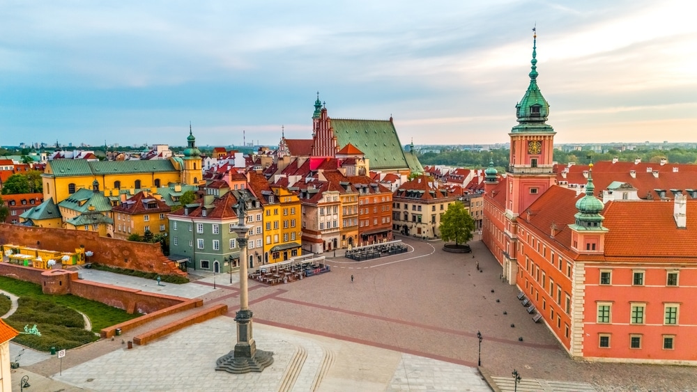 aerial view over the castle square in warsaw overlooking the old town in spring at dawn
