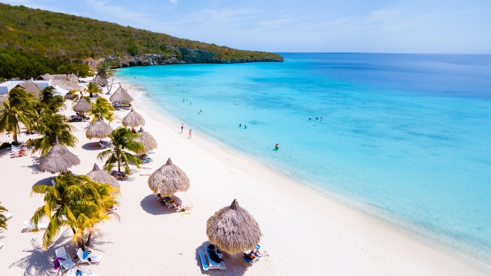 Cas Abao Beach Playa Cas Abao Curacao Caribbean island of Curacao, Playa Cas Abao with beach chairs and umbrellas in Curacao and a turqouse colored ocean