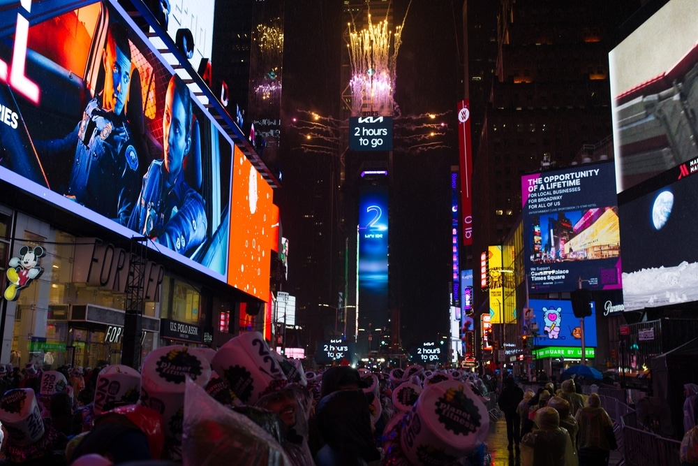New York, NY - December 31, 2024: Ryan Seacrest and Rita Ora join the festivities at the Times Square New Year’s Eve celebration, alongside Dustin Lynch, Lonnie Quinn, and NYC agencies.