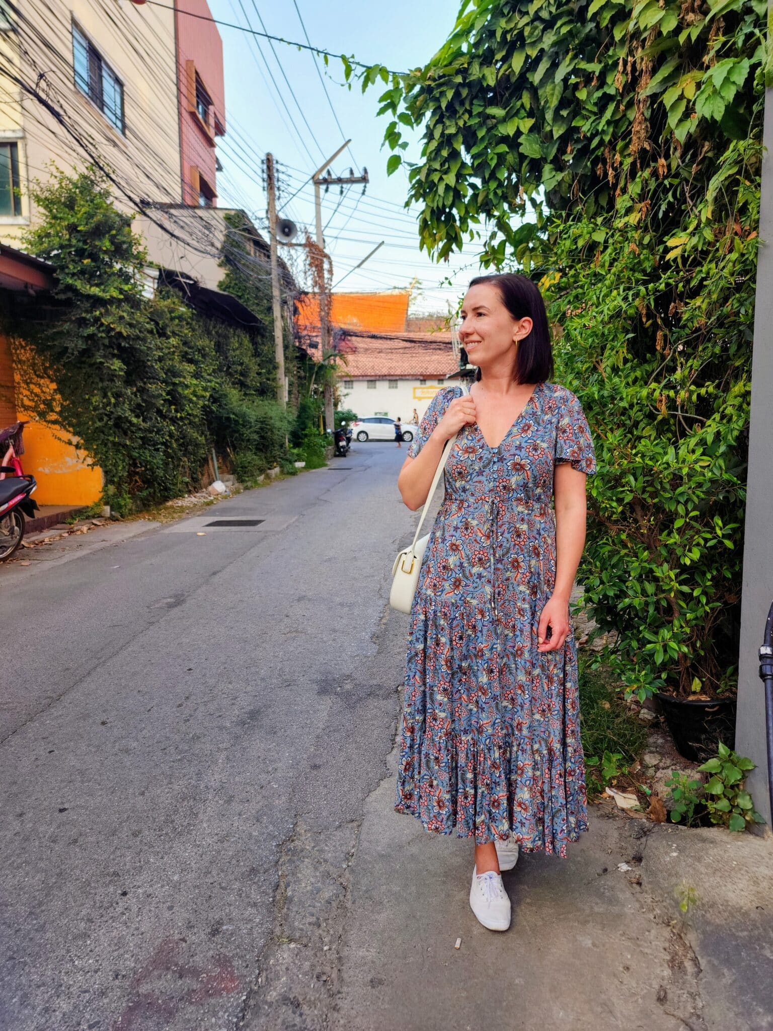Lindsey wearing a salty crush dress and Keds sneakers in Chang Mai Thailand