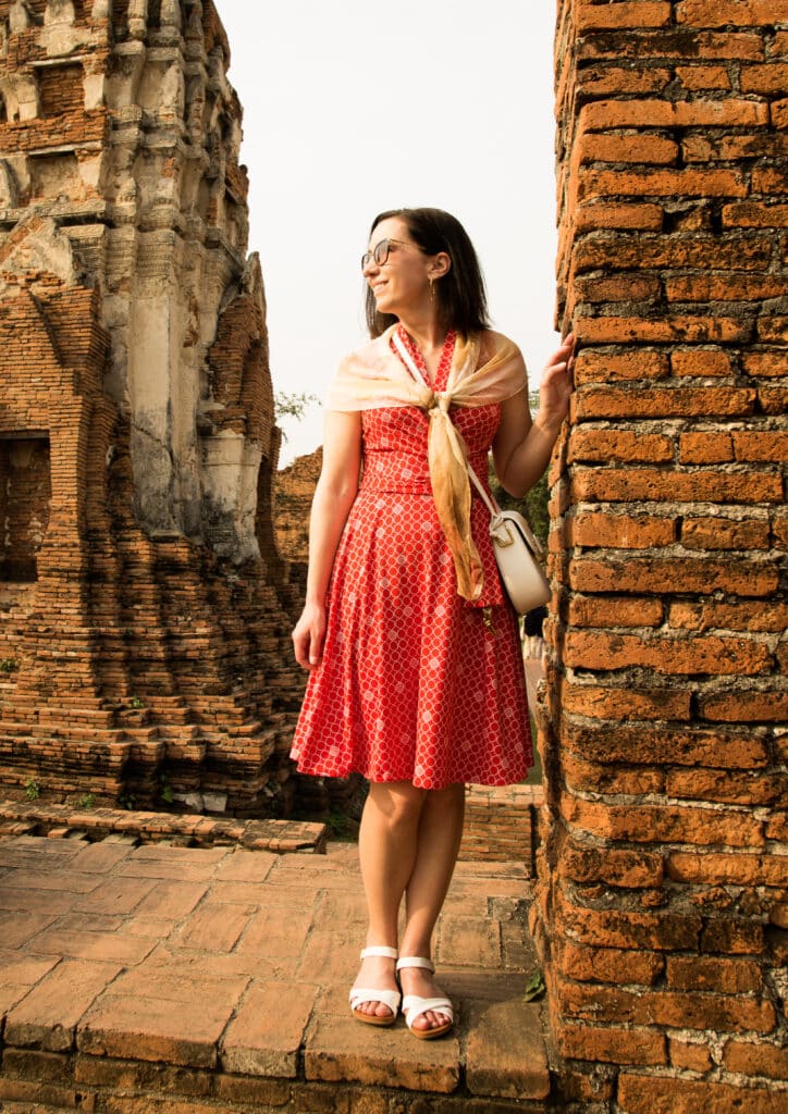 Lindsey in Bangkok thailand wearing a dress and scarf