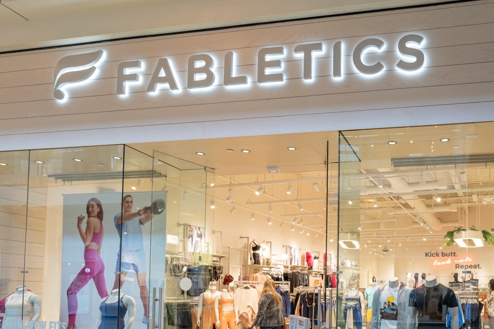 Houston, Texas, USA - February 25, 2022: A Fabletics store in a shopping mall. Fabletics is a global, active lifestyle brand that sells both men's and women's sportswear, footwear and accessories.
