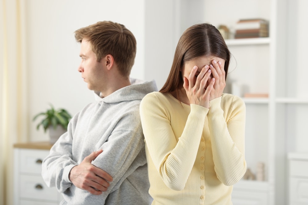 Woman and man having fight at home