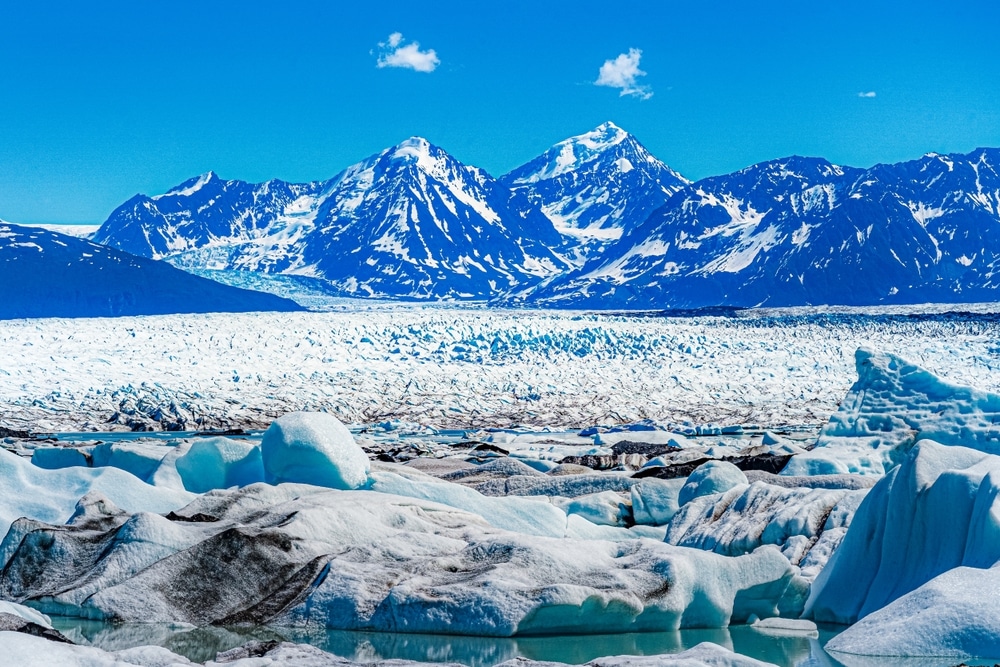 The majestic glacial landscape of Kenai Fjords National Park offers a serene view of wonder and symmetry.