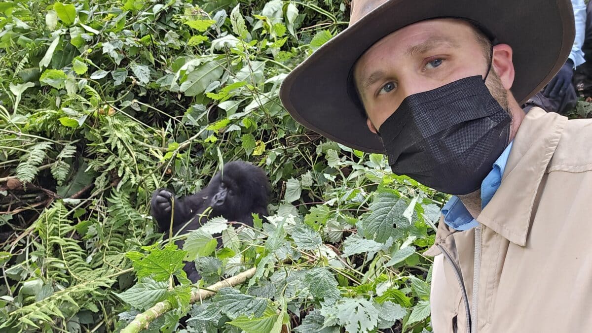 Zac wearing his face mask by the gorillas