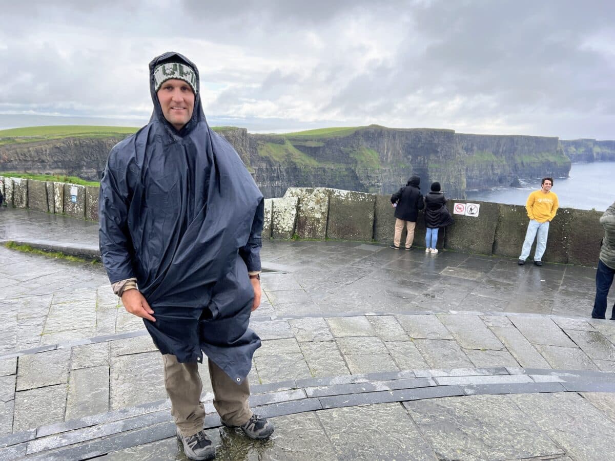 Zac wearing his rain poncho