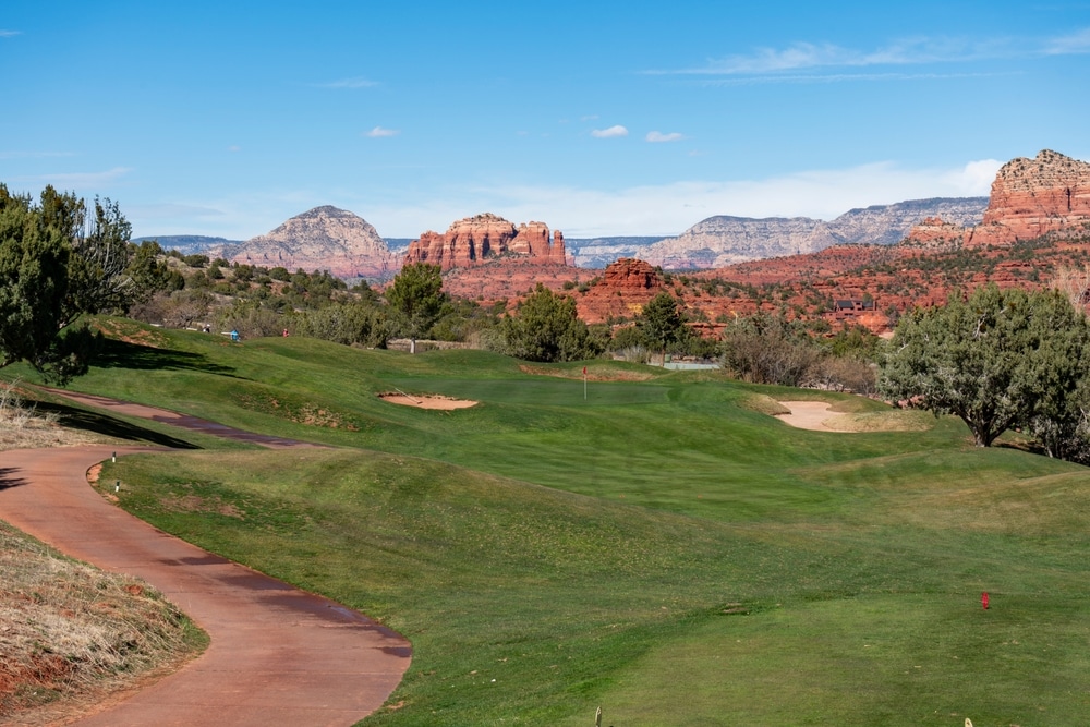 Panoramic view of Sedona, Ariozna and golf course par 3 hole in desert landscape