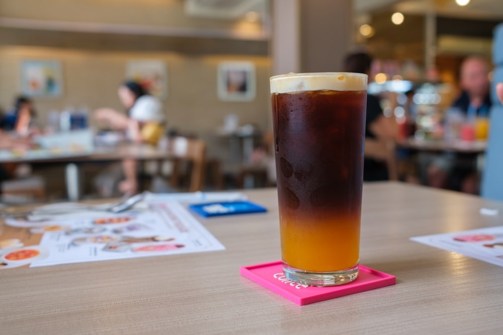 Iced Americano with Orange Juice Served as Popular Menu in Thailand on a Sunny Day