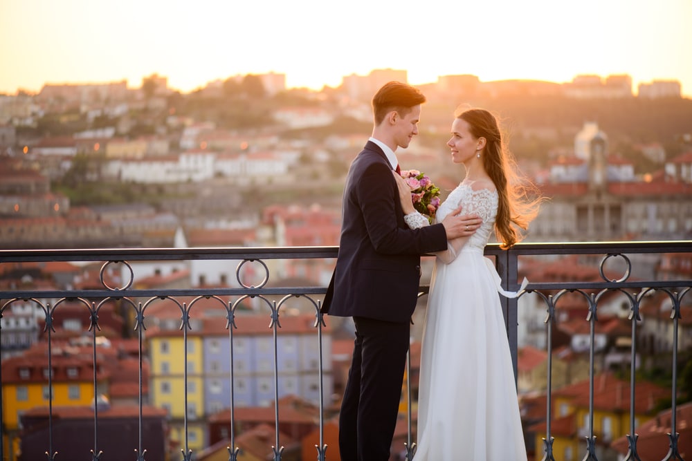 happy young couple a bright and rays of light in Portugal